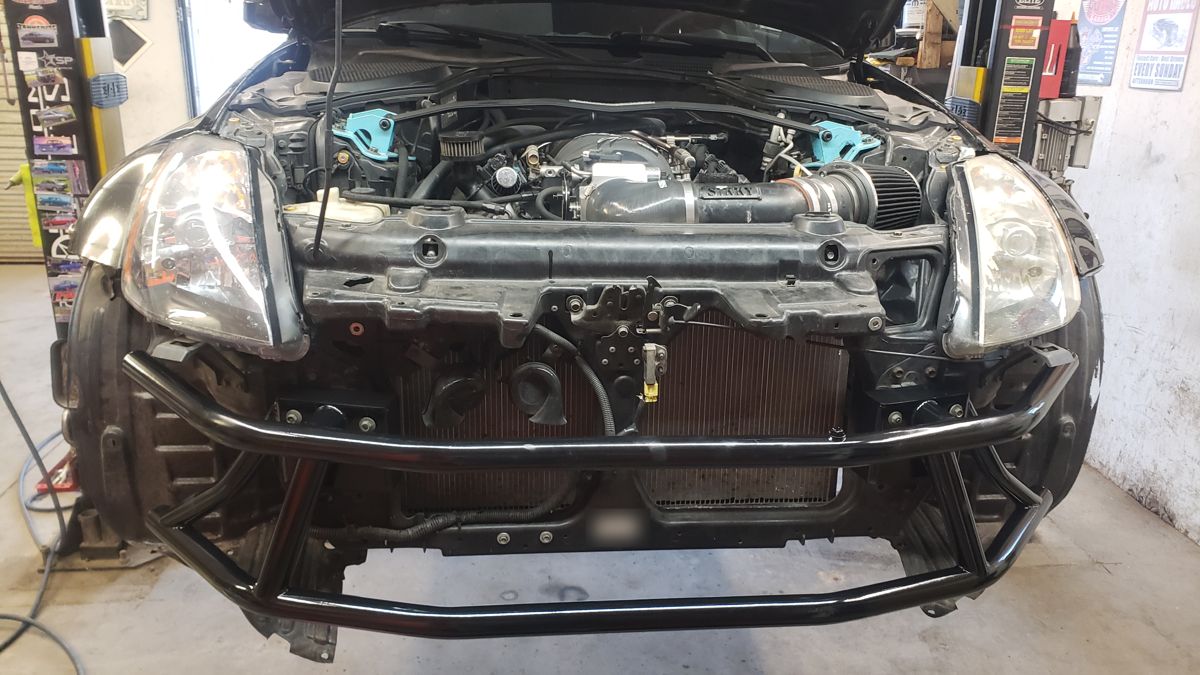 Black front bash bar on the 350Z, head-on, with the Sikky intake visible