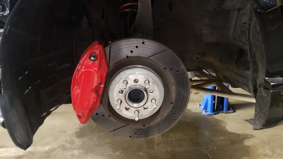 Red caliper and rotor up front