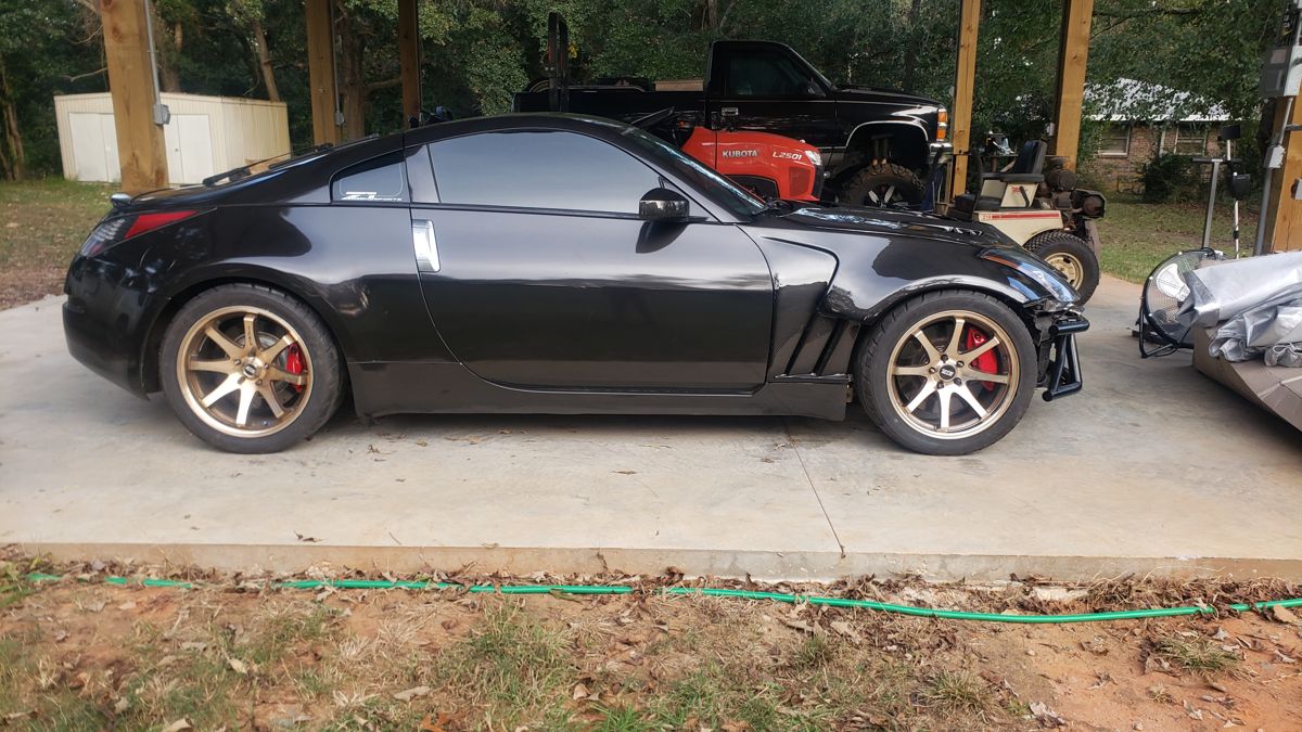 On bronze wheels with the bash bar and red calipers