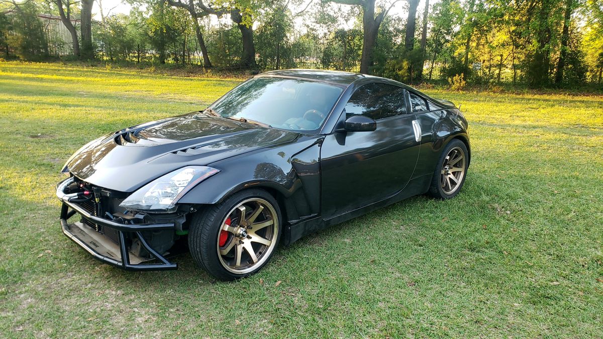 Carbon hood with the bash bar, front three-quarter