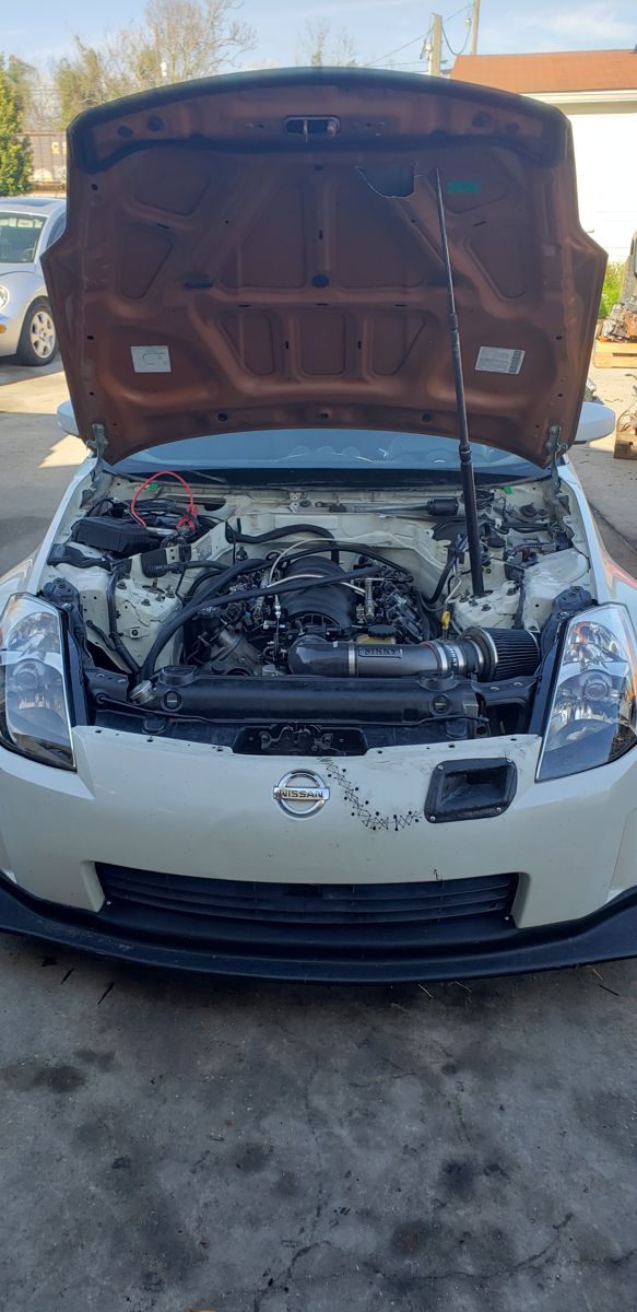 White 350Z from the front, hood up, LS in the bay with Sikky intake