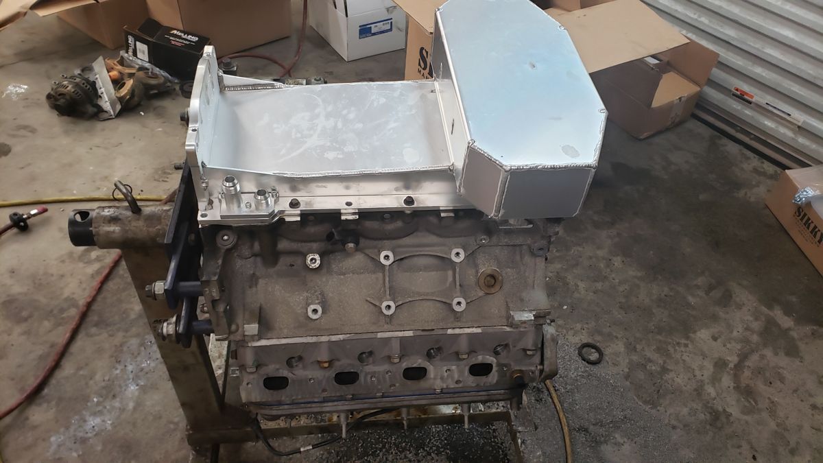 Aluminum swap oil pan mocked up on the block