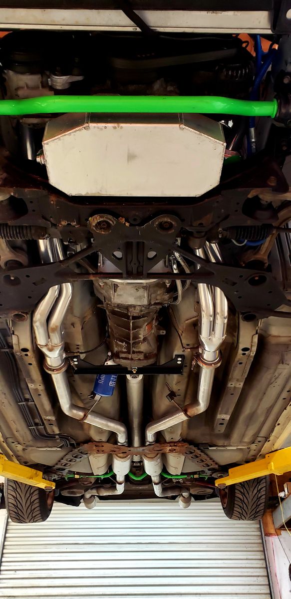 Underside of the white Z: aluminum swap oil pan, T56 and long-tube headers