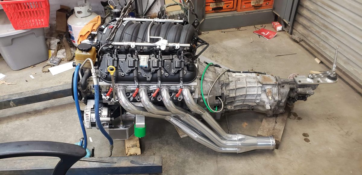 LS with long-tube headers and transmission on a stand