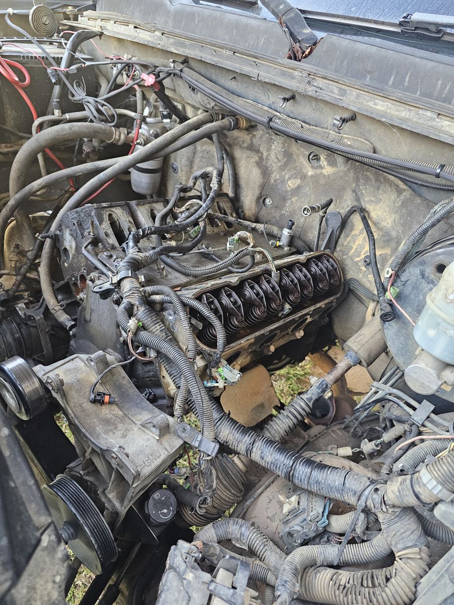 Original 4.8 V8 partly torn down in the Silverado engine bay