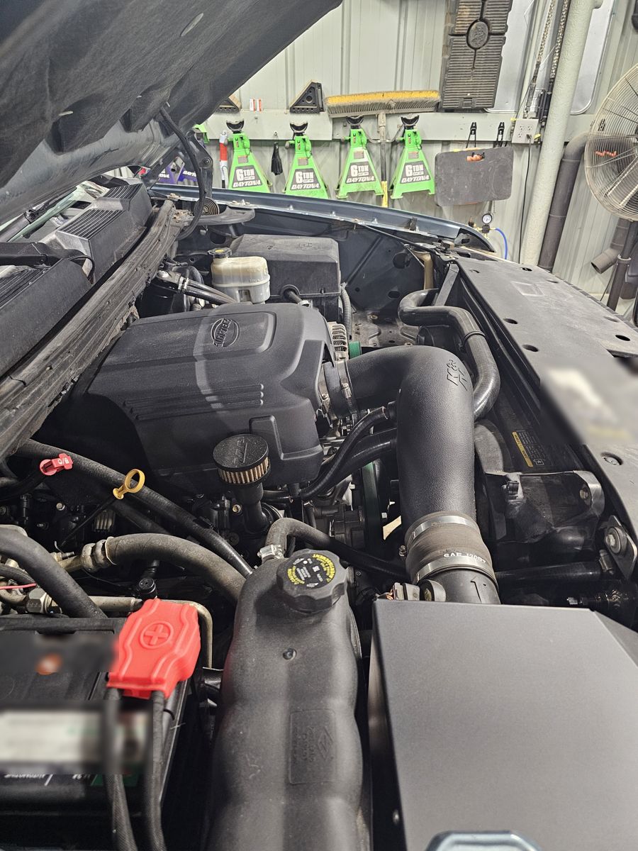 Driver side: intake and silicone upper hose