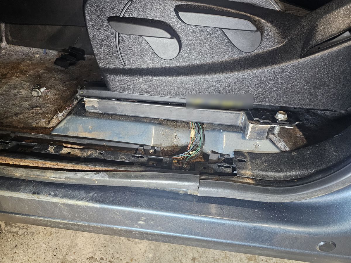 Homemade seat bracket bolted in