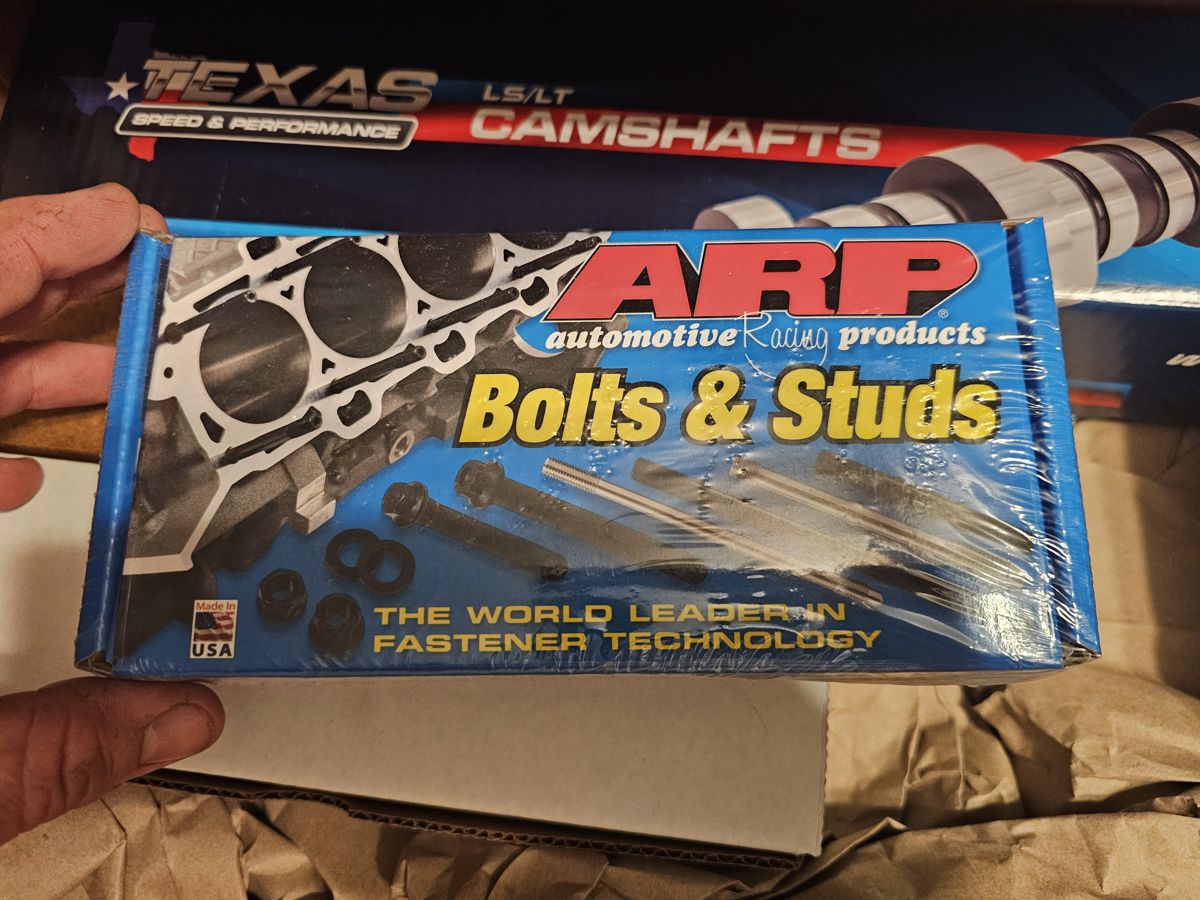 ARP Pro Series head bolt kit box in front of a Texas Speed camshaft box