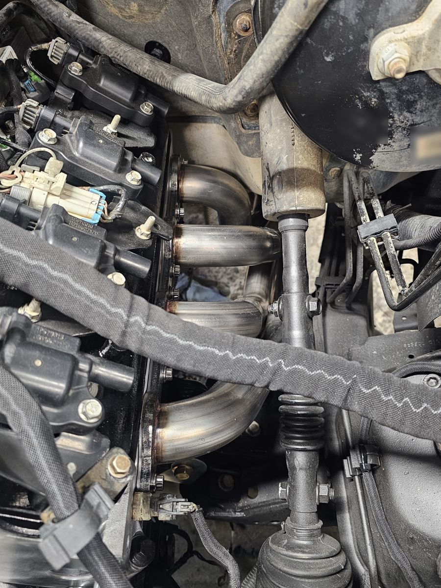 Driver side headers in
