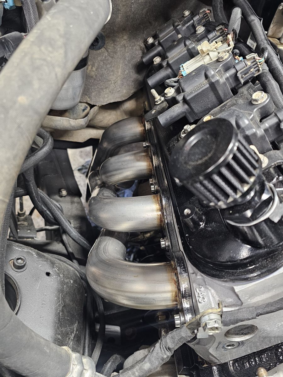 Passenger side headers in