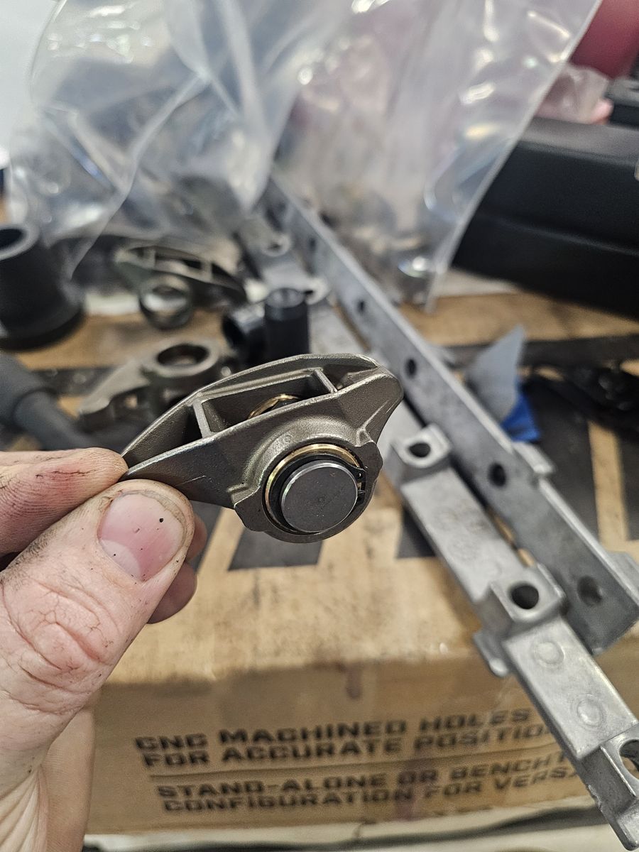 Rocker with the bronze bushing and new trunnion in