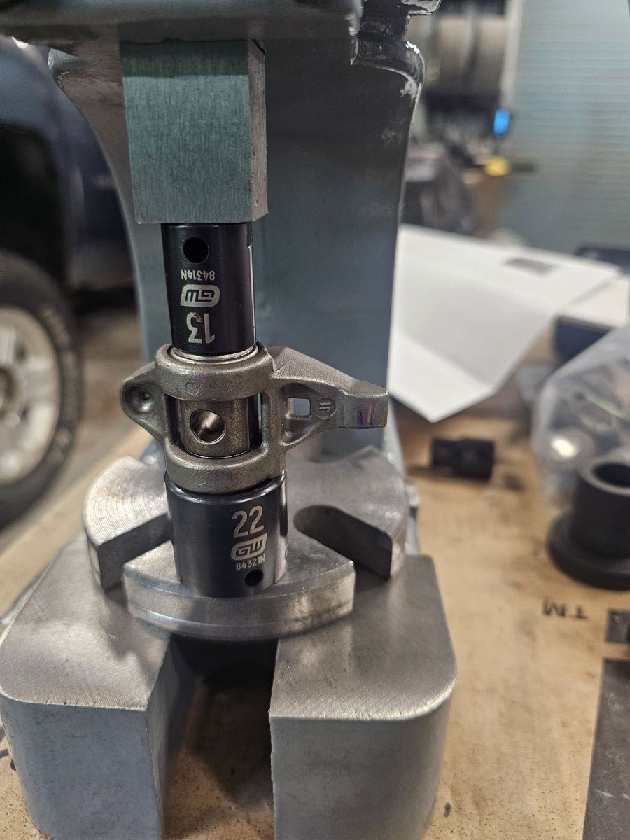 Pressing a rocker arm for the trunnion upgrade