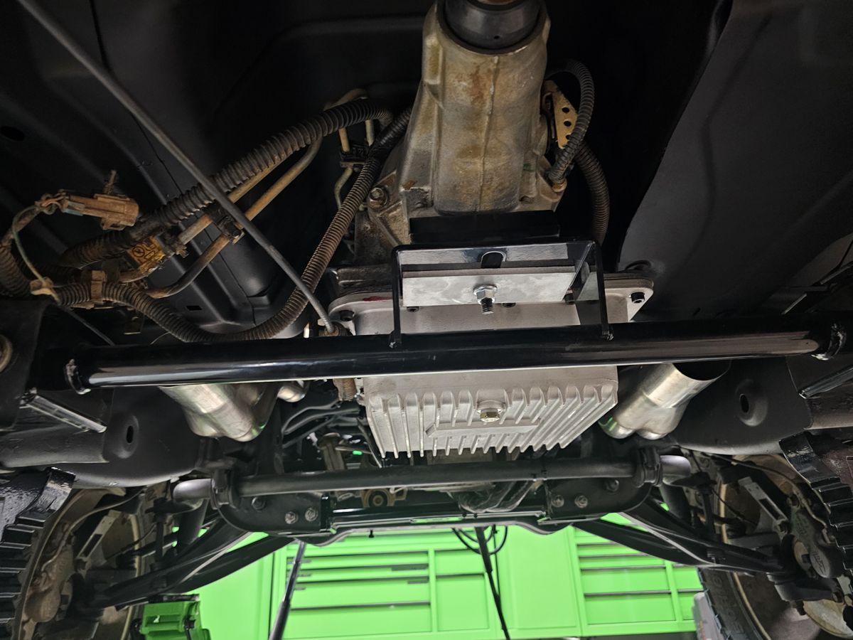 Deep pan and crossmember
