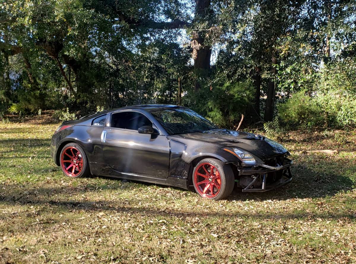LS-swapped 350Z on red wheels